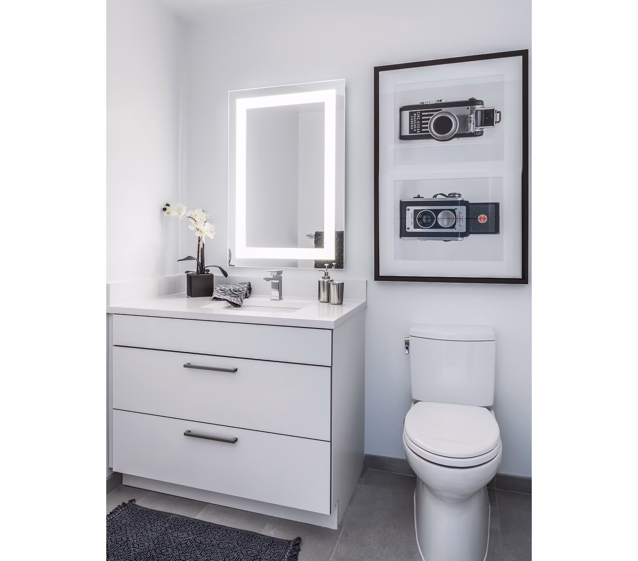 Luxurious bathroom with sleek fixtures at Lantera at Boston Landing Apartments, featuring modern design and premium finishes