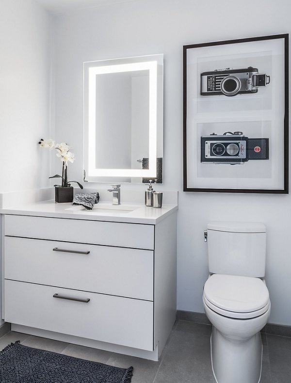 Luxurious bathroom with sleek fixtures at Lantera at Boston Landing Apartments, featuring modern design and premium finishes