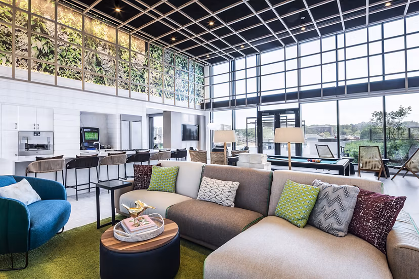 Modern clubhouse featuring spacious lobby at Lantera at Boston Landing Apartments