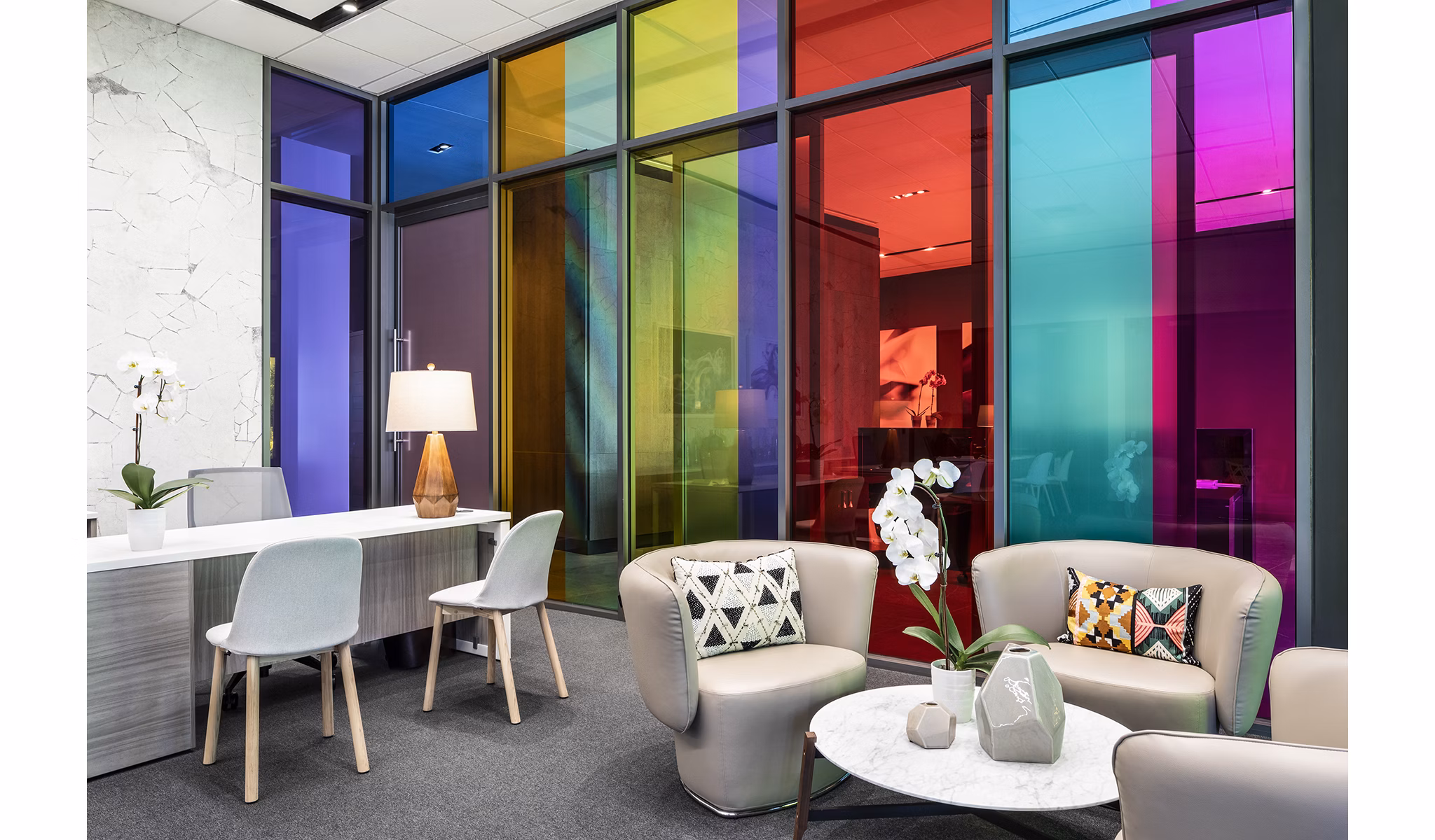 Clubhouse lobby with contemporary design and comfortable seating at Lantera at Boston Landing Apartments