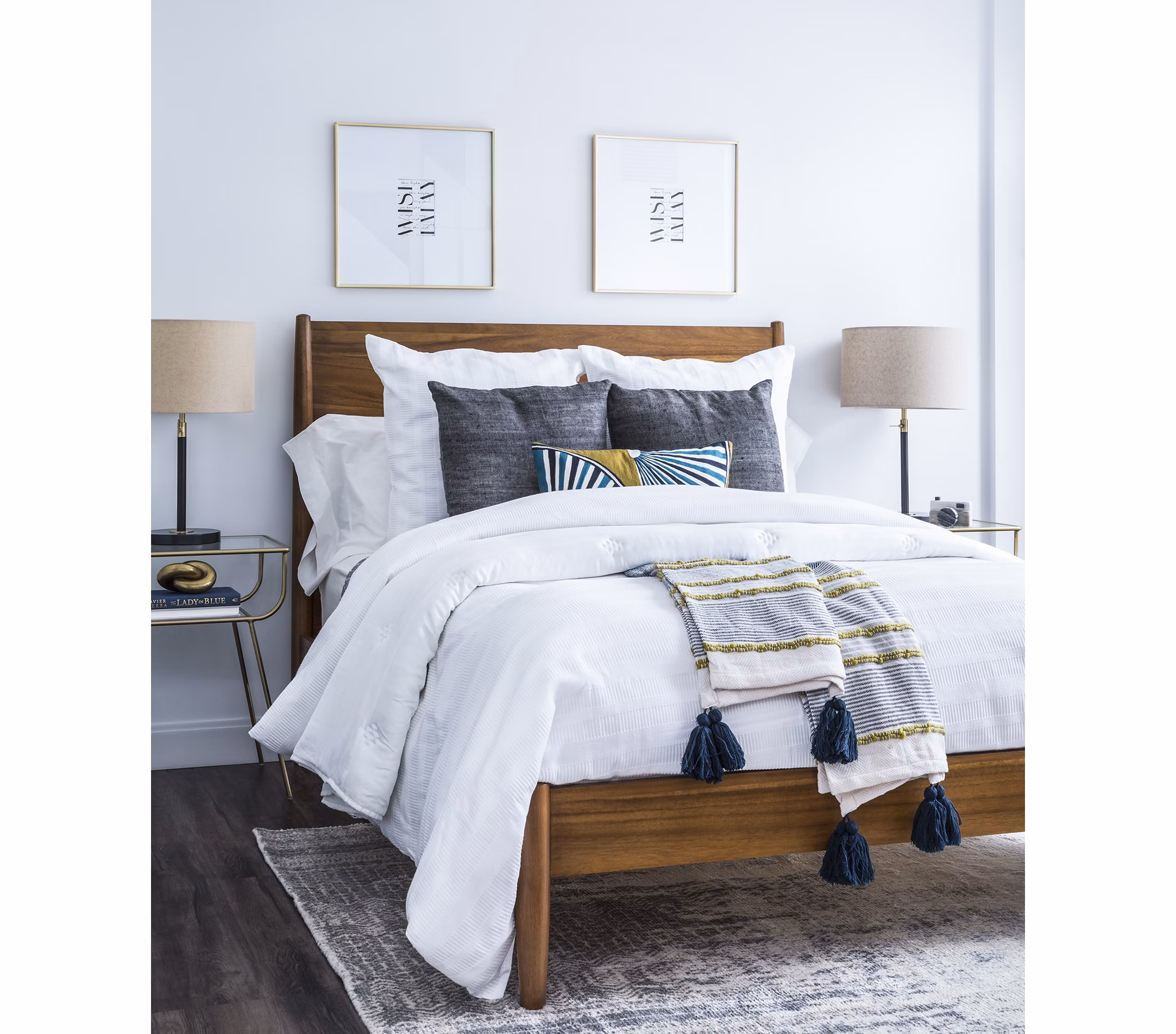 Cozy bedroom with stylish decor at Lantera at Boston Landing Apartments