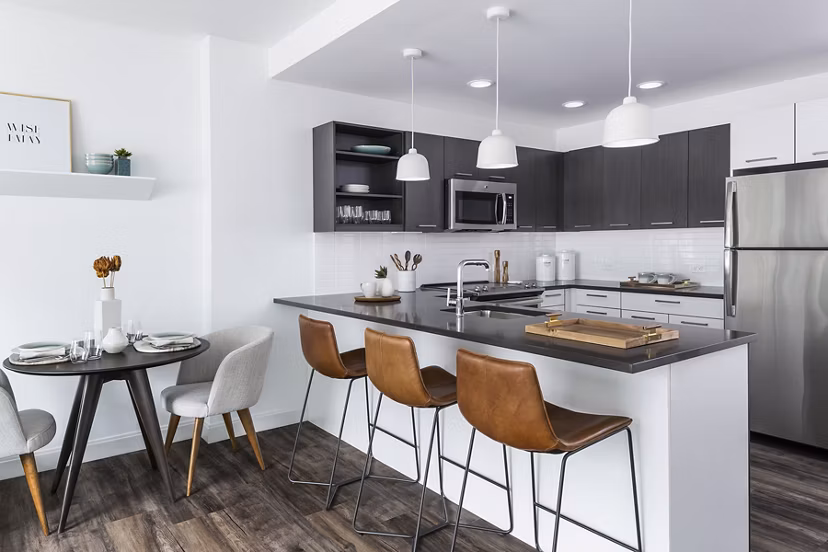 Lantera at Boston Landing: Elegant dining room with modern furnishings in luxury apartments