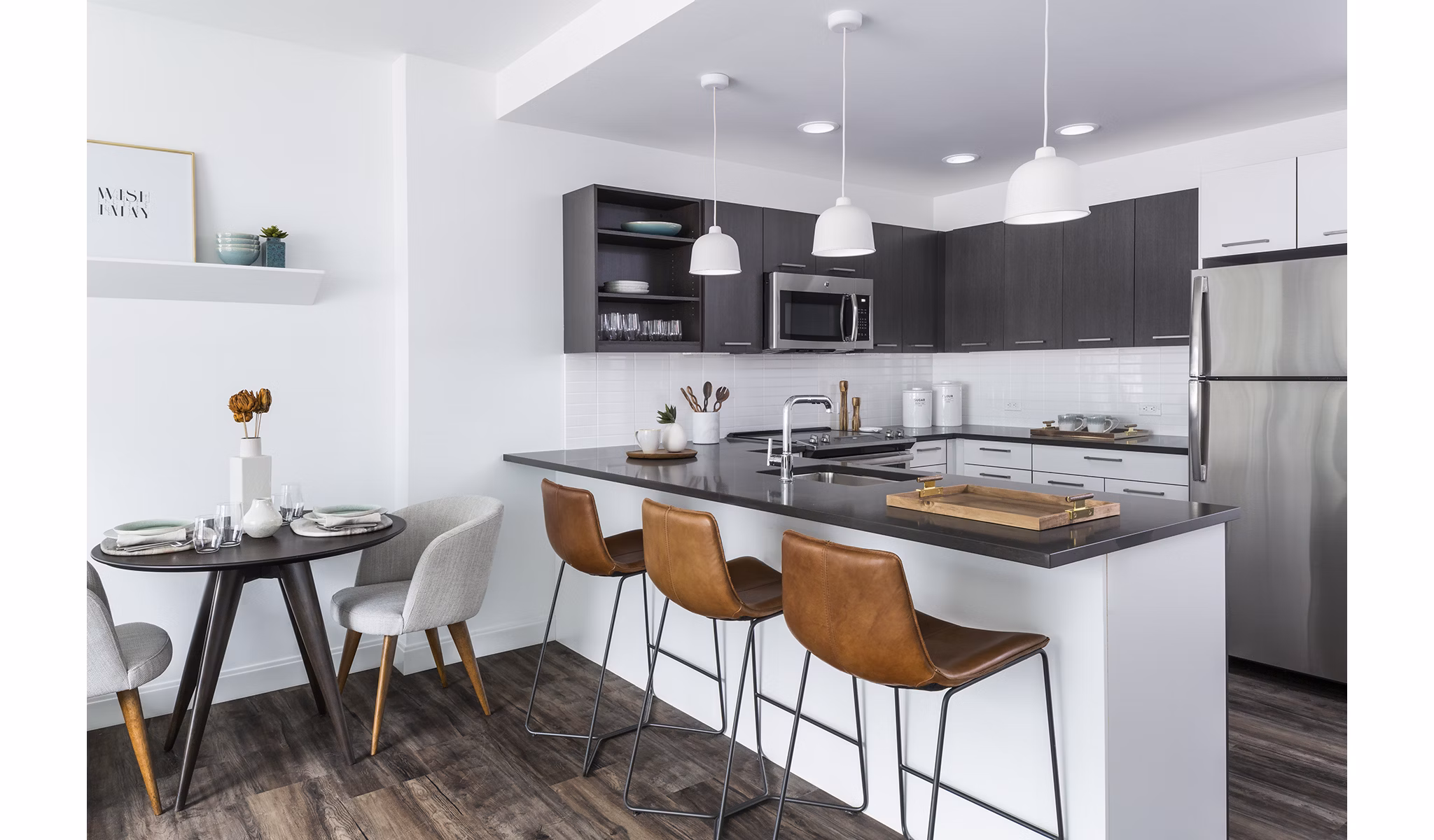 Lantera at Boston Landing: Elegant dining room with modern furnishings in luxury apartments