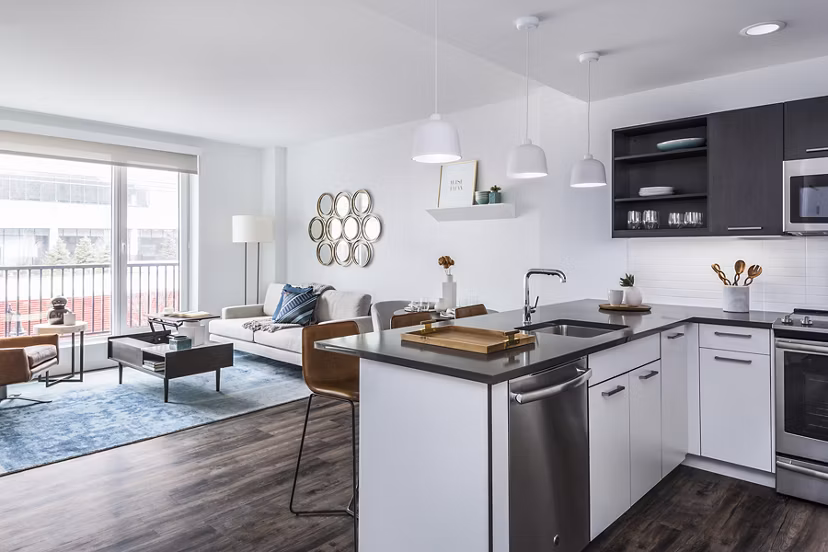 Sleek kitchen with modern appliances in Lantera at Boston Landing Apartments, luxury homes near downtown