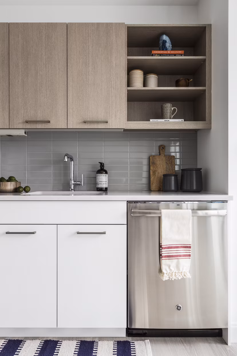Modern kitchen featuring sleek countertops and stainless steel appliances at Lantera at Boston Landing Apartments