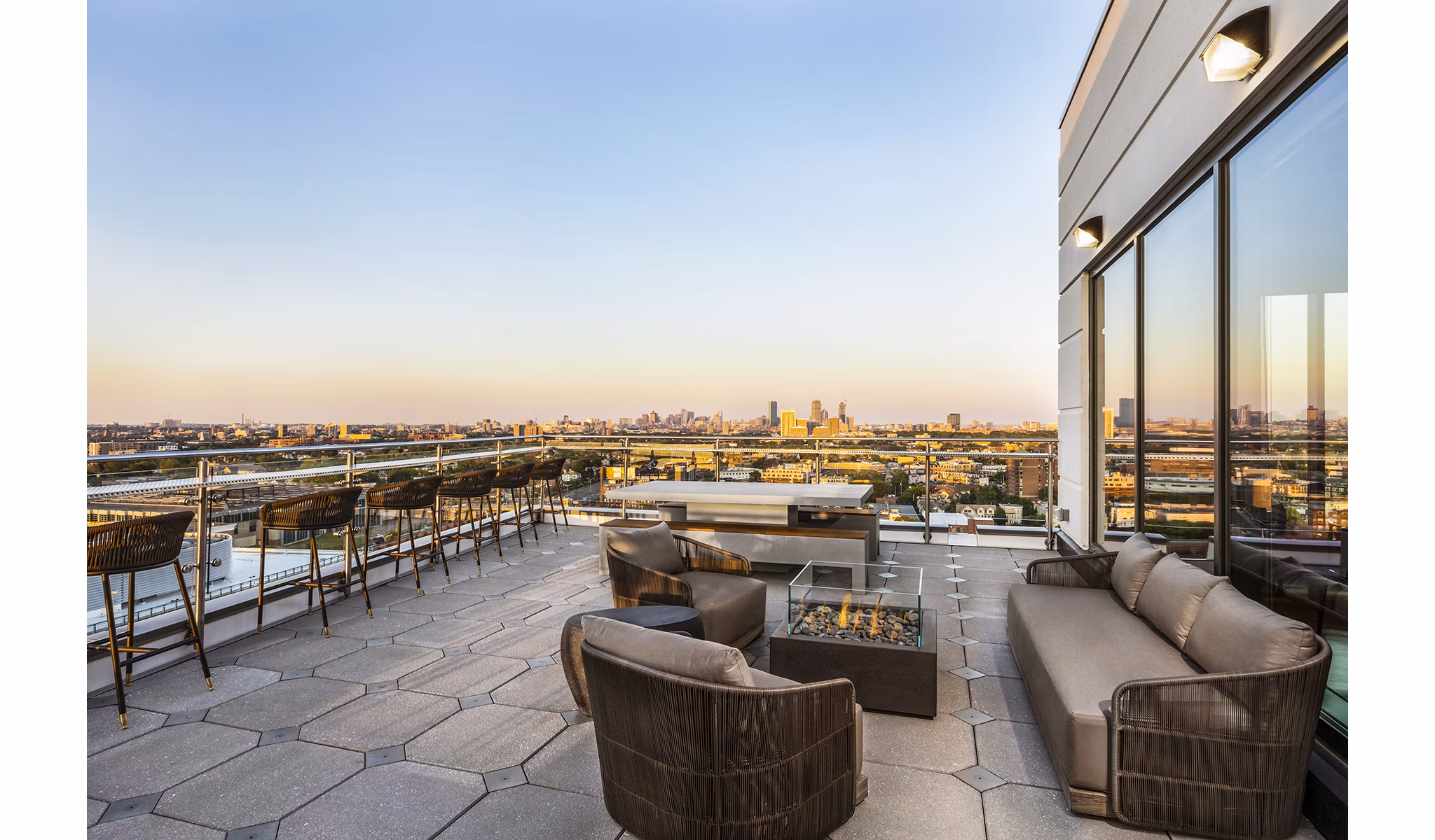 Private balcony with sleek furnishings at Lantera at Boston Landing Apartments