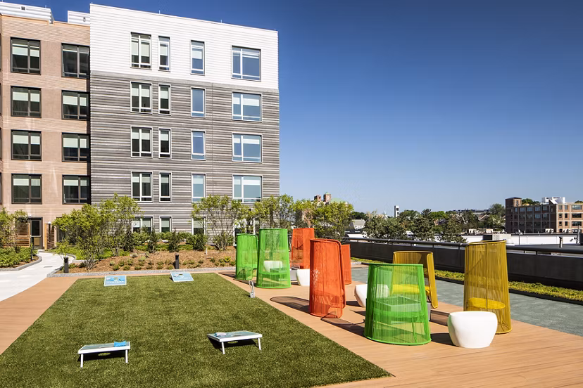 Outdoor sport court for basketball and tennis at Lantera at Boston Landing Apartments in Boston