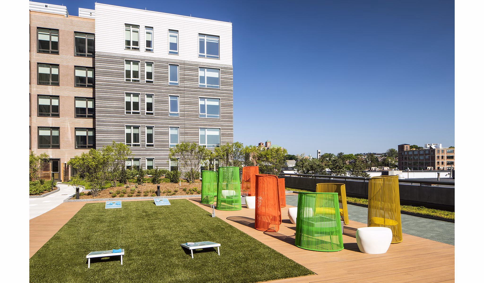 Outdoor sport court for basketball and tennis at Lantera at Boston Landing Apartments in Boston