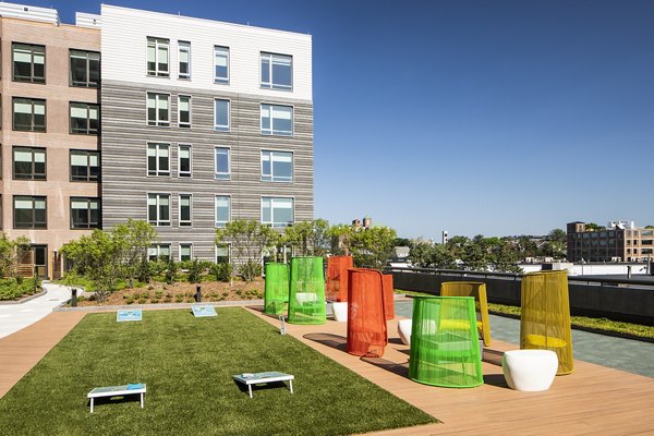 Outdoor sport court for basketball and tennis at Lantera at Boston Landing Apartments in Boston