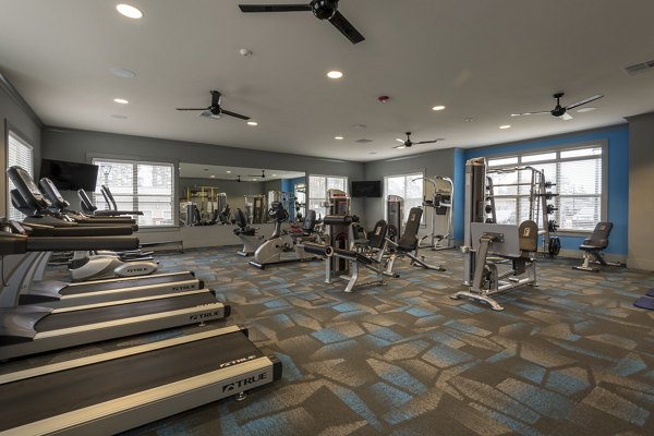 State-of-the-art fitness center with modern equipment at The Franklin at Crossroads Apartments