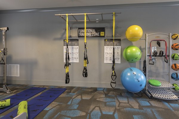 State-of-the-art fitness center with modern equipment at The Franklin at Crossroads Apartments