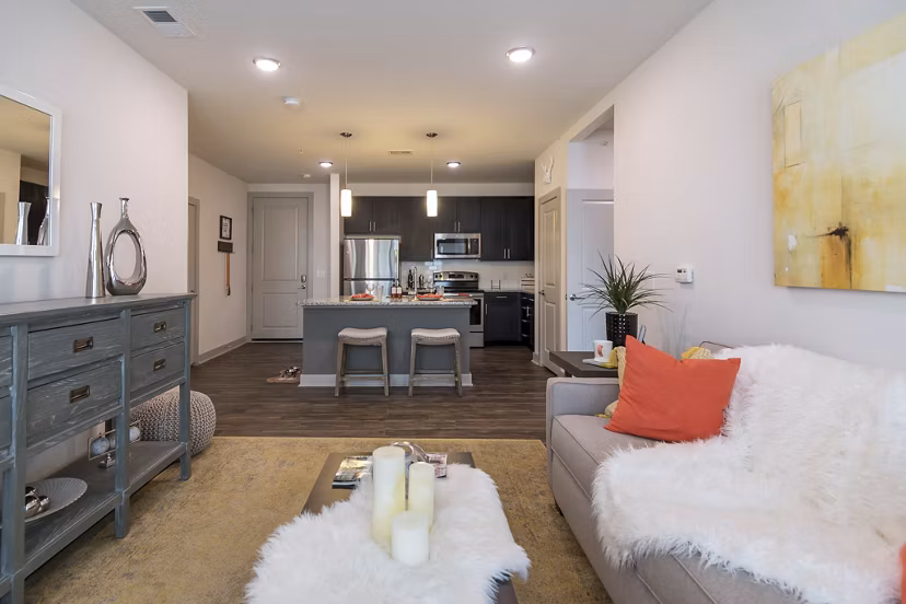 The Franklin at Crossroads: Cozy living room with modern decor and natural light