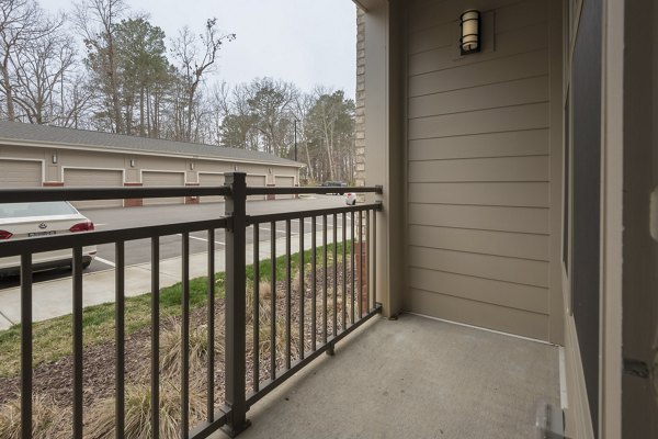 Spacious patio with modern furniture at The Franklin at Crossroads Apartments