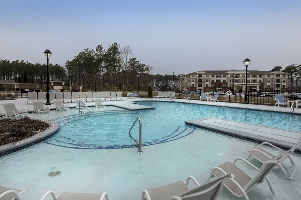 Resort-style pool at The Franklin at Crossroads Apartments, offering luxury living amenities in a serene environment