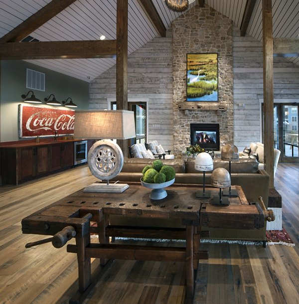 Modern clubhouse featuring spacious seating areas at One Hampton Lake Apartments
