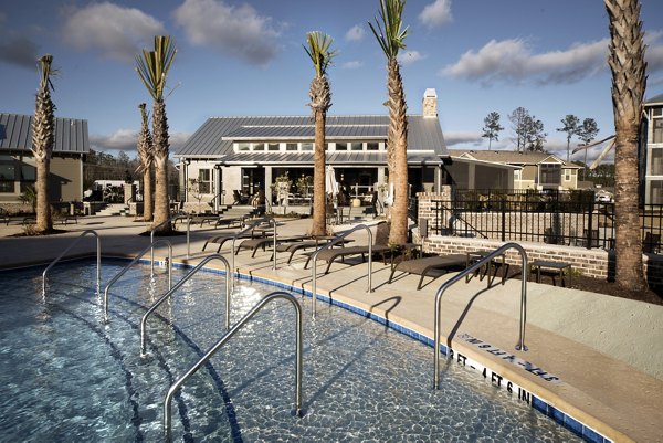 Resort-style pool at One Hampton Lake Apartments offering luxury outdoor leisure experience