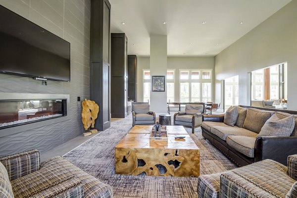Elegant clubhouse featuring modern design at Grand Oaks at Crane Creek Apartments