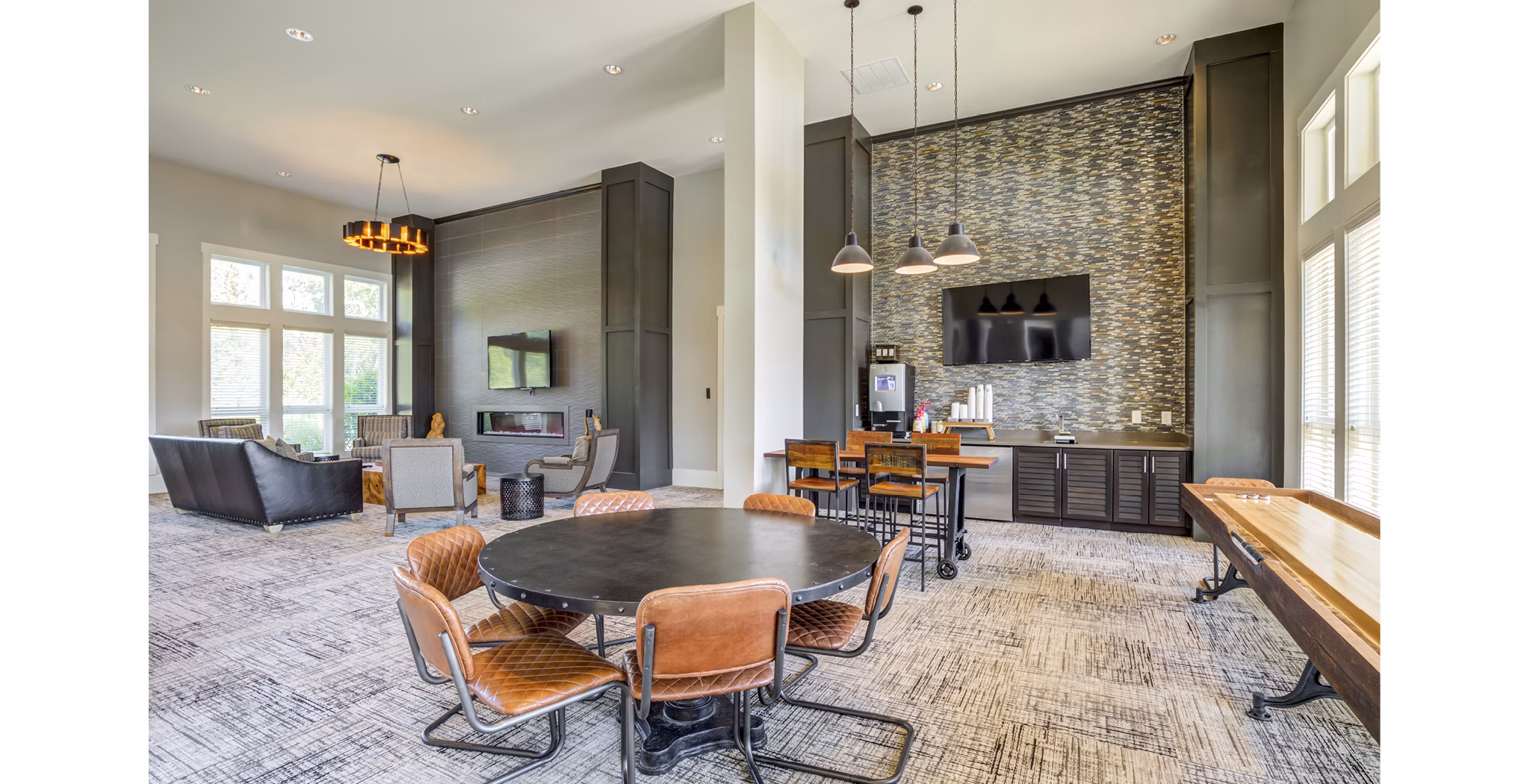 Luxurious clubhouse featuring modern design at Grand Oaks at Crane Creek Apartments