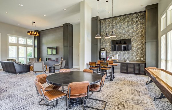 Luxurious clubhouse featuring modern design at Grand Oaks at Crane Creek Apartments
