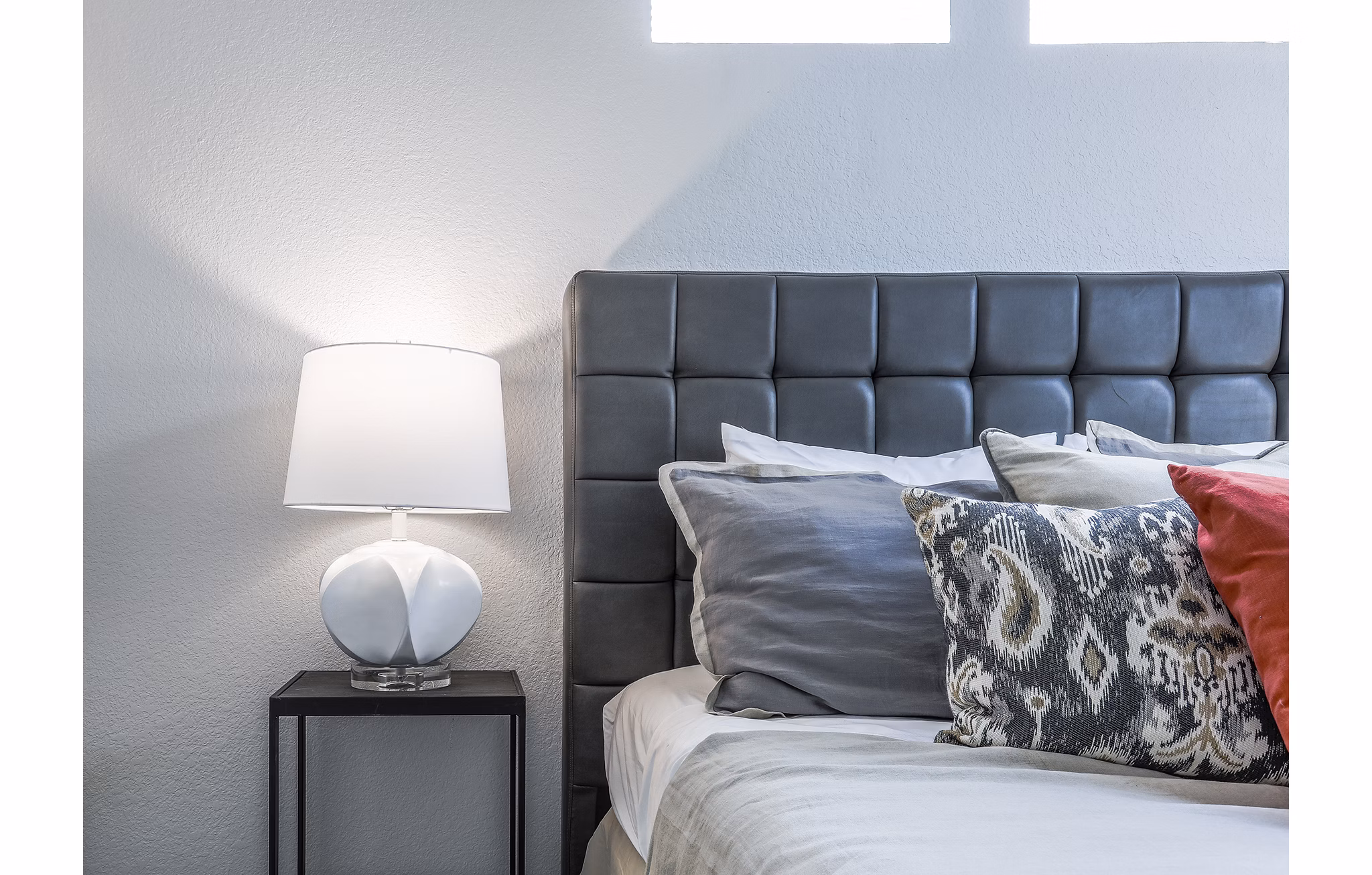 Cozy bedroom with modern decor at Avana Eastlake Apartments