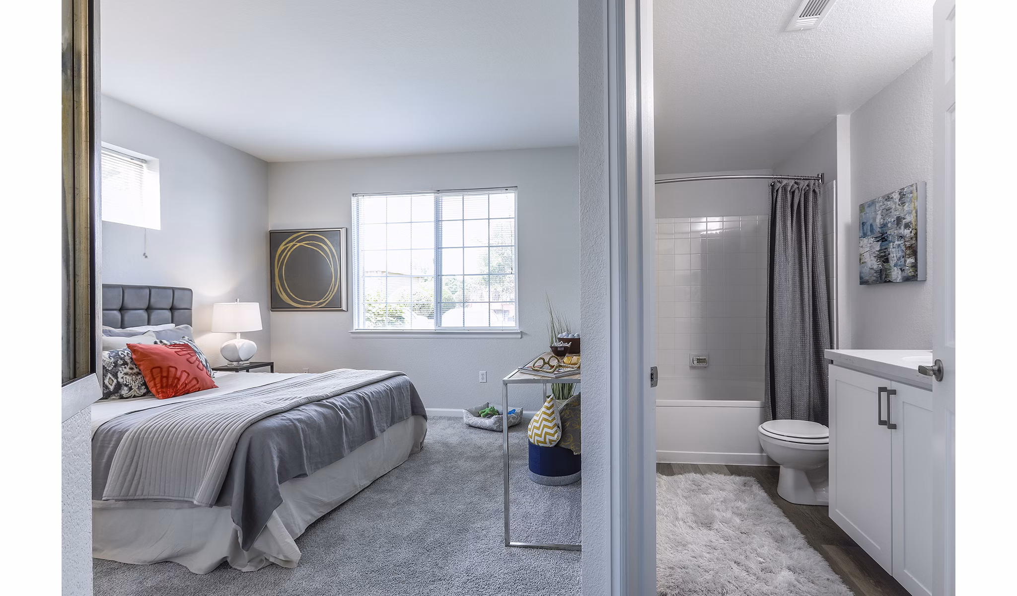 Bedroom featuring contemporary design and plush bedding at Avana Eastlake Apartments