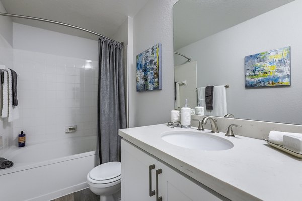 Modern bathroom with sleek fixtures at Avana Eastlake Apartments, a Greystar luxury property