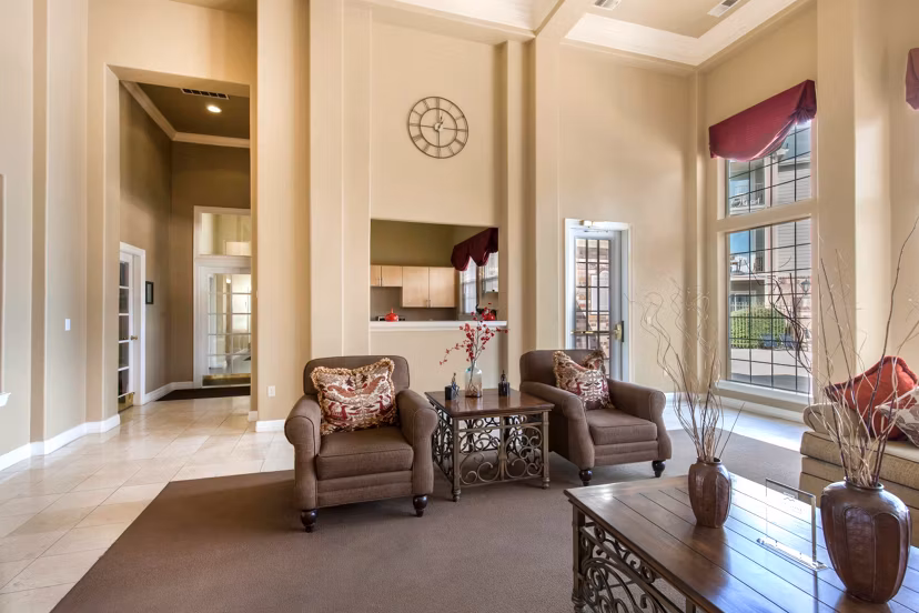 Modern clubhouse with cozy seating areas at Avana Eastlake Apartments in Orlando, Florida