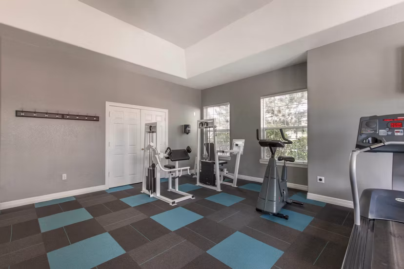 Modern fitness center with state-of-the-art equipment at Avana Eastlake Apartments