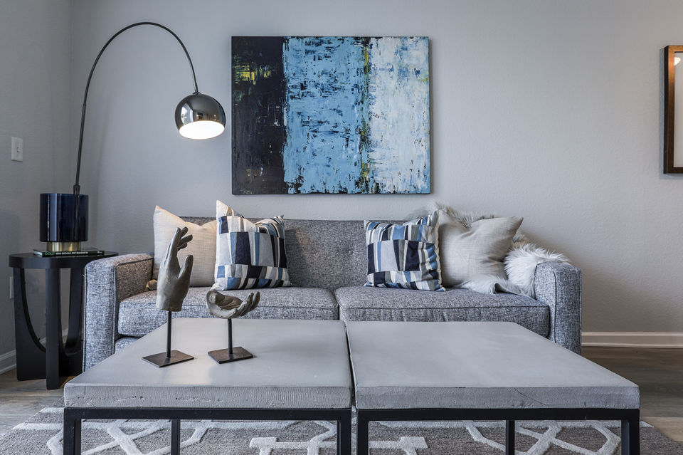 Spacious living room with modern decor at Avana Eastlake Apartments, a luxury property by Greystar