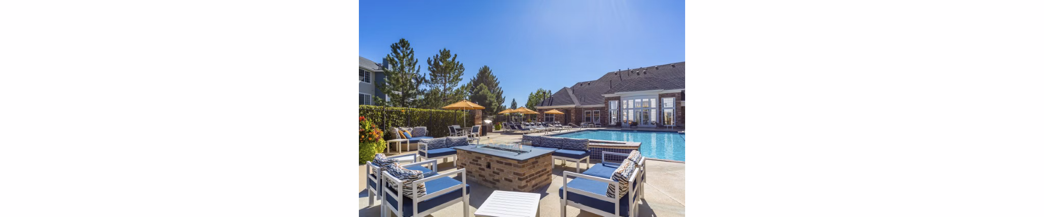 Cozy evening by the fire pit at Avana Eastlake Apartments, featuring comfortable seating and ambient lighting for a luxury outdoor experience