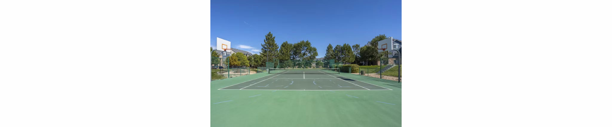 Lighted sport court at Avana Eastlake Apartments for basketball and other outdoor activities