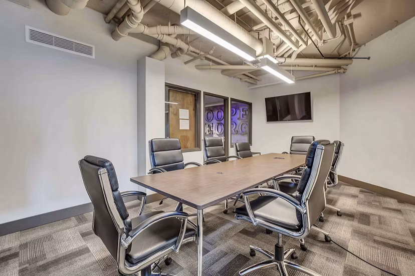 Modern meeting facility equipped with advanced technology at Cooper George Apartments