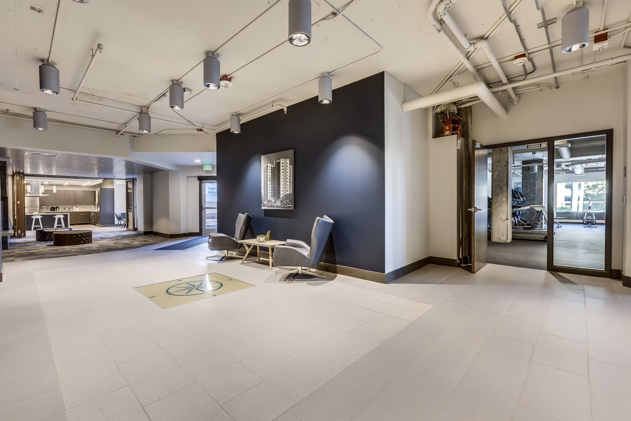 Elegant clubhouse with contemporary design at Cooper George Apartments, ideal for social gatherings and community events