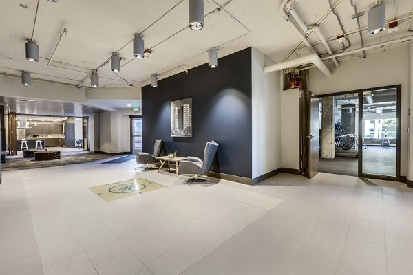 Elegant clubhouse with contemporary design at Cooper George Apartments, ideal for social gatherings and community events