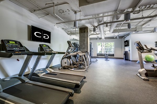 State-of-the-art fitness center featuring modern equipment at Cooper George Apartments