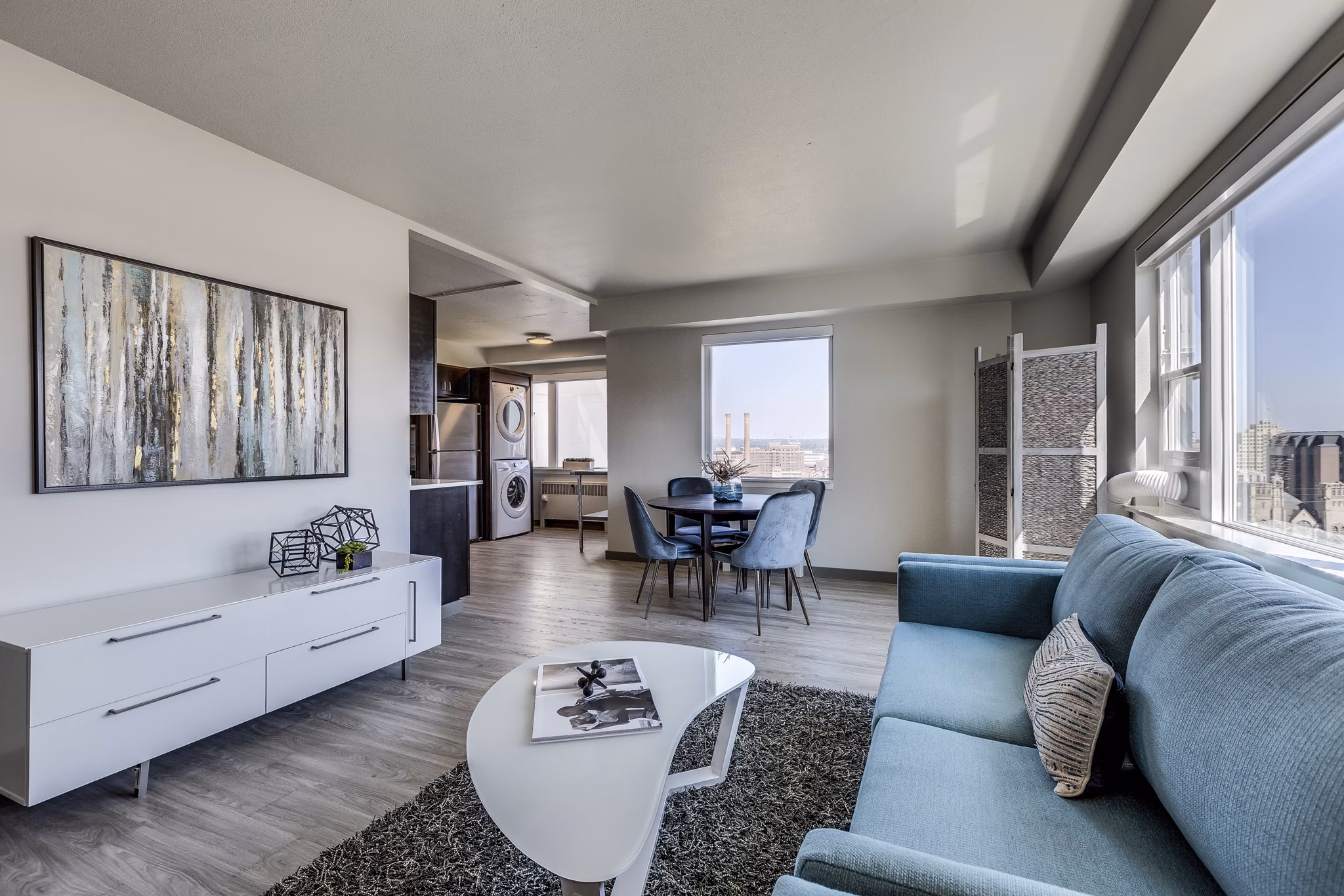 Spacious living room with modern decor at Cooper George Apartments
