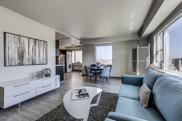Spacious living room with modern decor at Cooper George Apartments