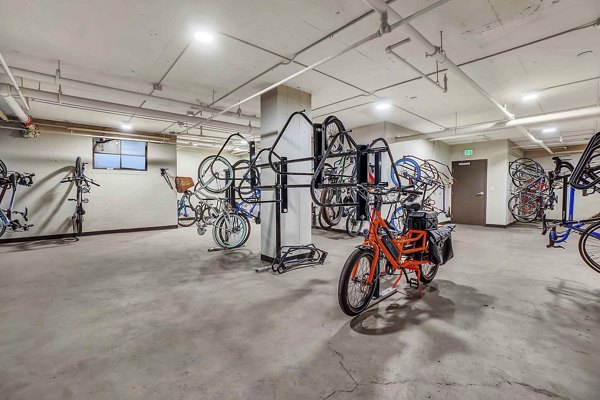 Secure bike storage facility at Cooper George Apartments for residents seeking convenient cycling access in luxury living environment