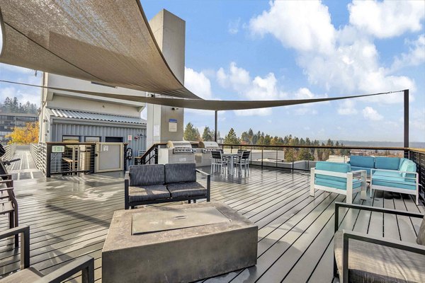 Rooftop deck offering stunning city views at Cooper George Apartments