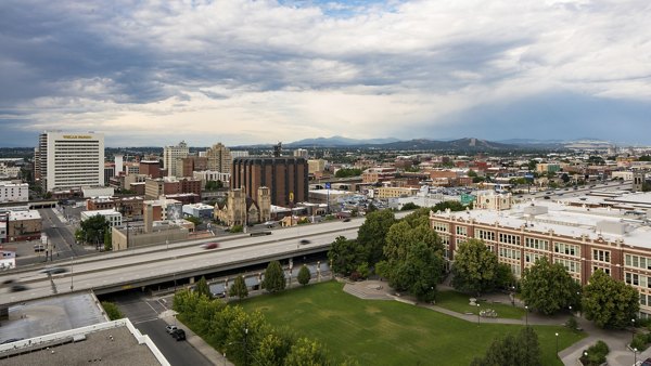 Cooper George Apartments: View of luxury high-rise in Seattle, showcasing modern design and urban living, Greystar property