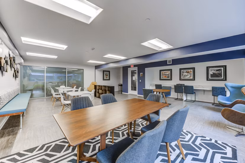 Clubhouse featuring modern design and stylish seating at Avana on Pine Apartments