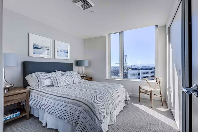 Cozy bedroom with modern decor at Ascent South Lake Union Apartments