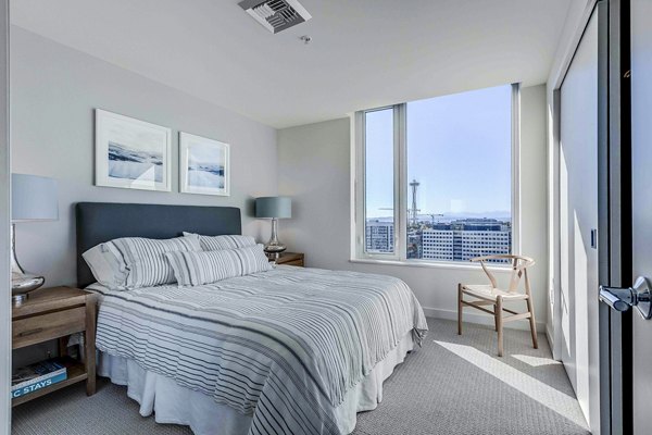 Cozy bedroom with modern decor at Ascent South Lake Union Apartments