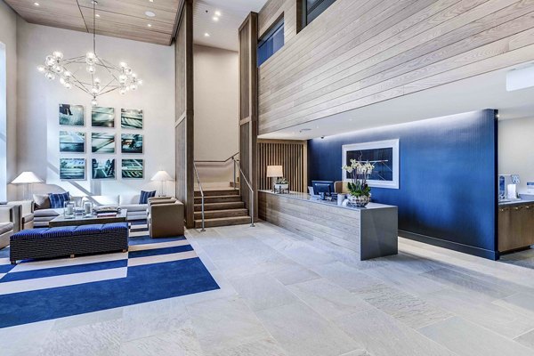 Clubhouse featuring modern design and seating at Ascent South Lake Union Apartments in Seattle, offering a luxurious community space for residents