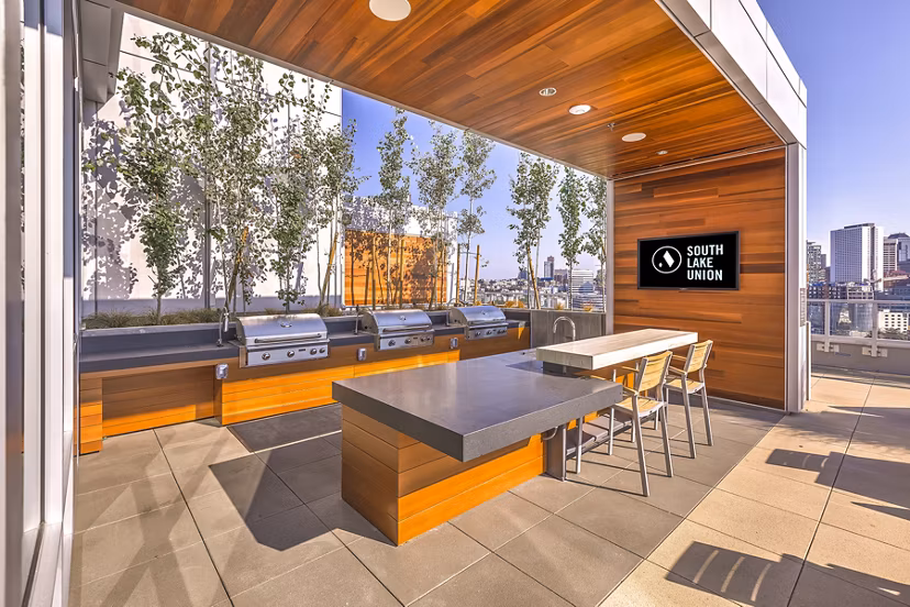 Outdoor grill area at Ascent South Lake Union Apartments, perfect for social gatherings and enjoying sunny Seattle days