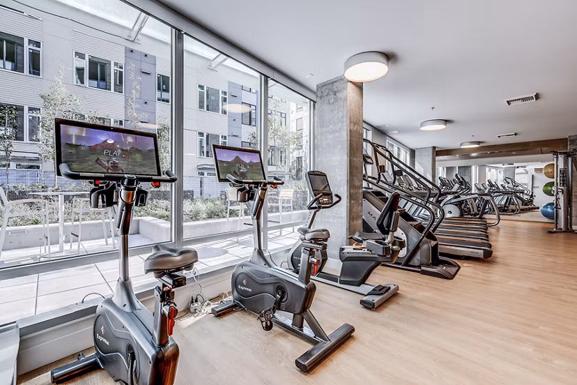 Modern fitness center with state-of-the-art equipment at Ascent South Lake Union Apartments