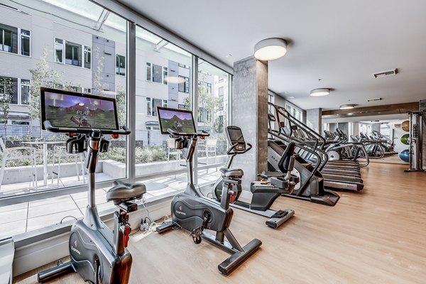 Modern fitness center with state-of-the-art equipment at Ascent South Lake Union Apartments