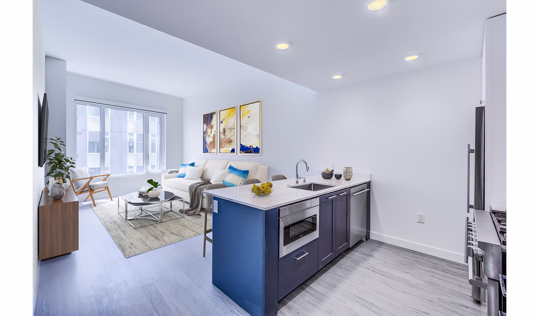 Modern kitchen with stainless steel appliances at Ascent South Lake Union Apartments
