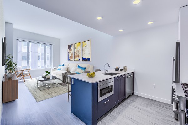 Modern kitchen with stainless steel appliances at Ascent South Lake Union Apartments