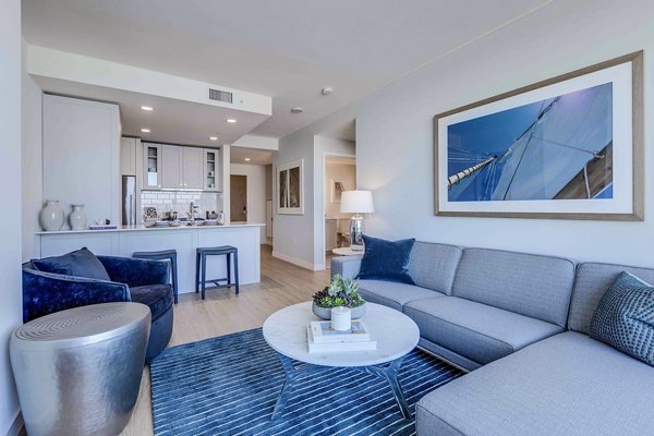 Spacious living room with modern decor in Ascent South Lake Union Apartments, offering luxury living in the heart of Seattle